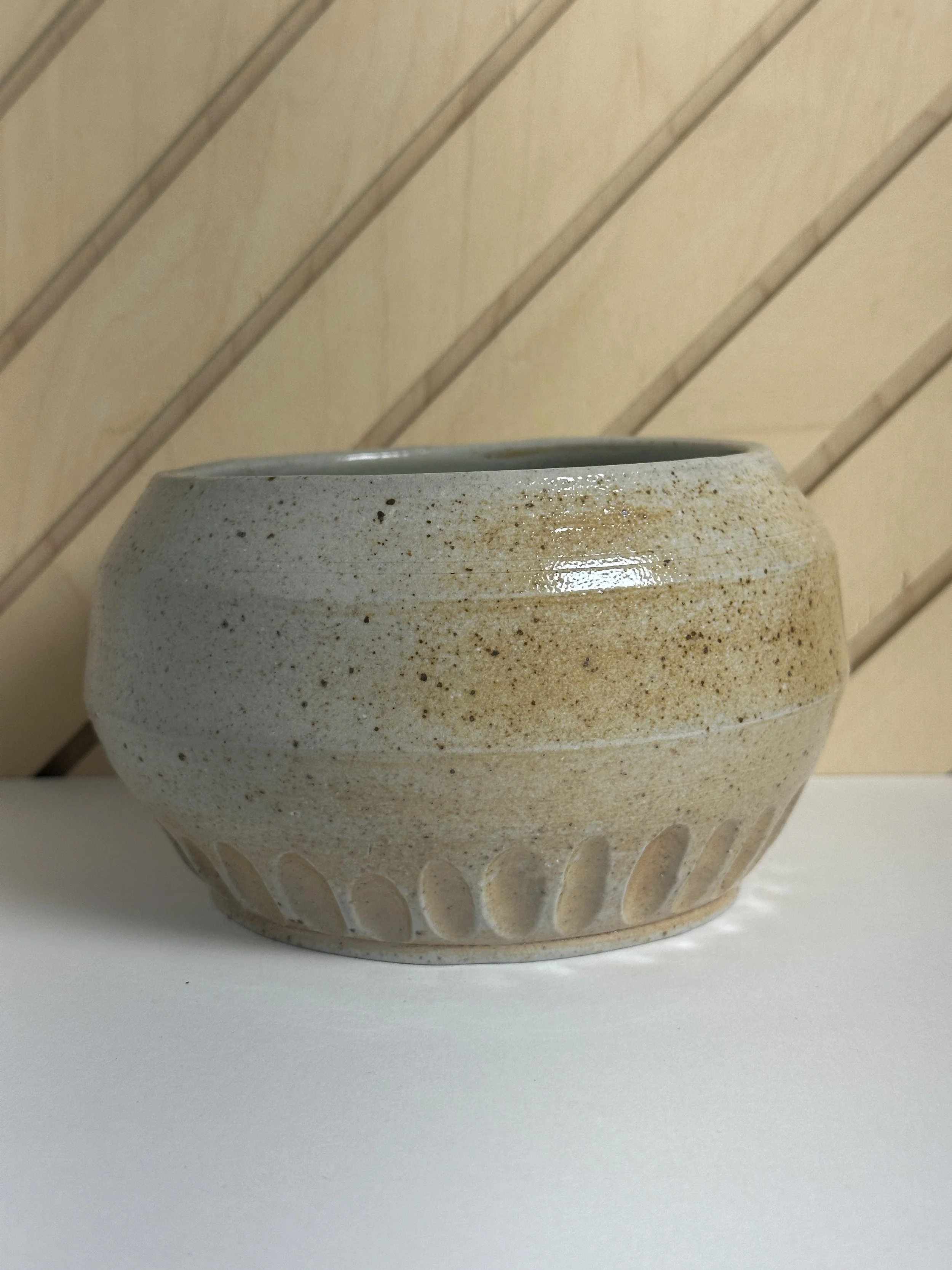 angled carved soda fired bowl