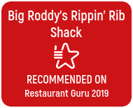 Red sign with white text that reads "Big Roddy's Rippin' Rib Shack," with a star and grill icon, and the words "Recommended on Restaurant Guru 2019."