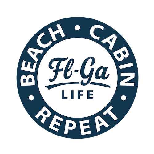 Circular logo with a navy blue border that reads 'Beach Cabins' at the top and 'Repeat' at the bottom. Inside the circle, it says 'Fl-Ga' in script font and 'Life' below in capital letters.
