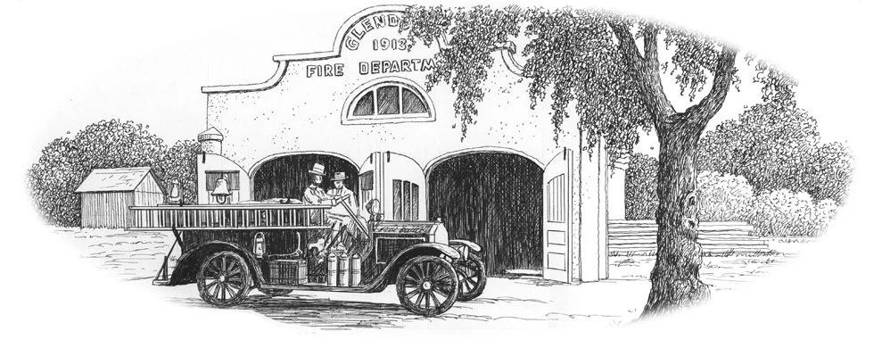 Historical illustration of a fire station with a vintage fire truck parked outside and two firefighters standing on it, with a large tree and small shed nearby. This was long used at the Glendora Historical Society's logo.