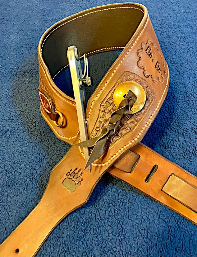 Guitar strap, Horween Horse Butt, Pigskin lining, basket weave stamping, Monogram, bear paw, ring and concho.