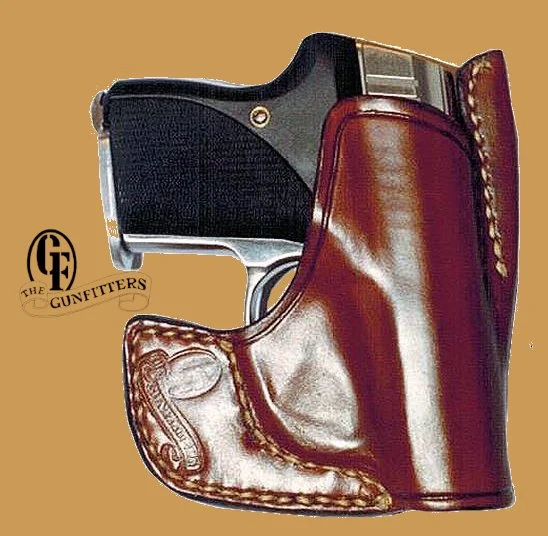 Seecamp .32 ACP, Push away top rib, breaks up outline in pocket, mimics wallet.