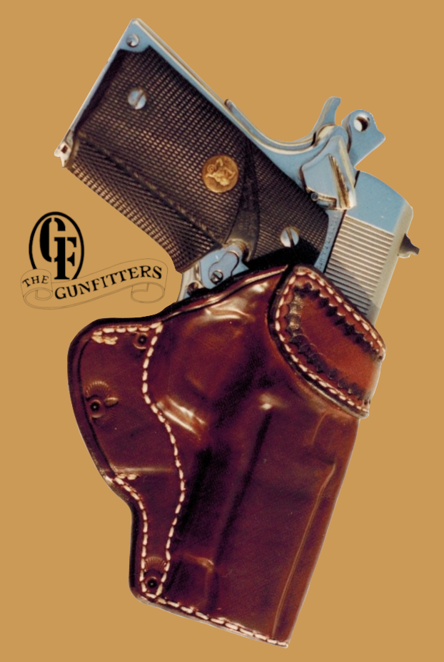 A highly polished nickle Colt handgun inside a brown leather holster, with a logo reading "The Gunfighters" on the left side.