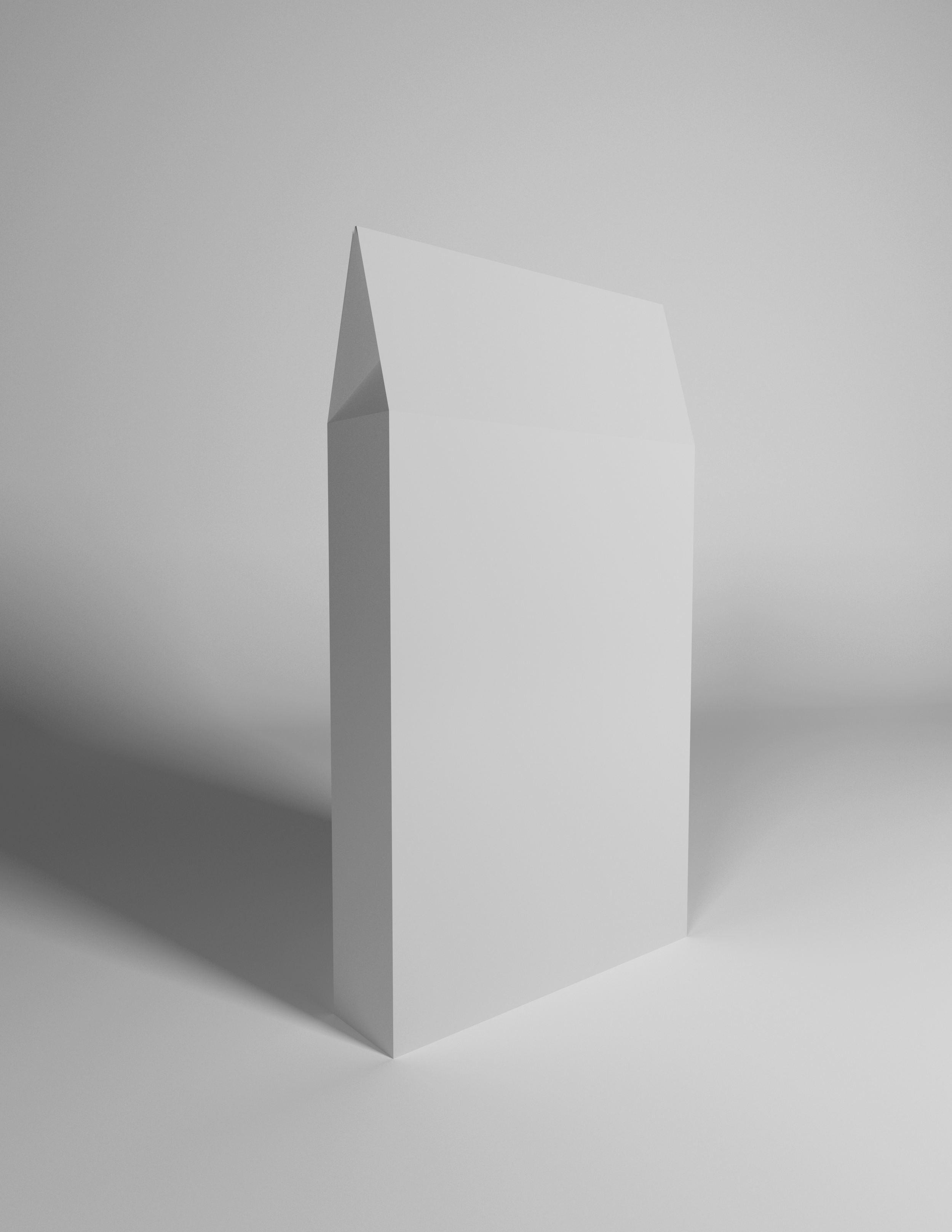A plain white rectangular box with a sloped top, casting a shadow on a light gray background.