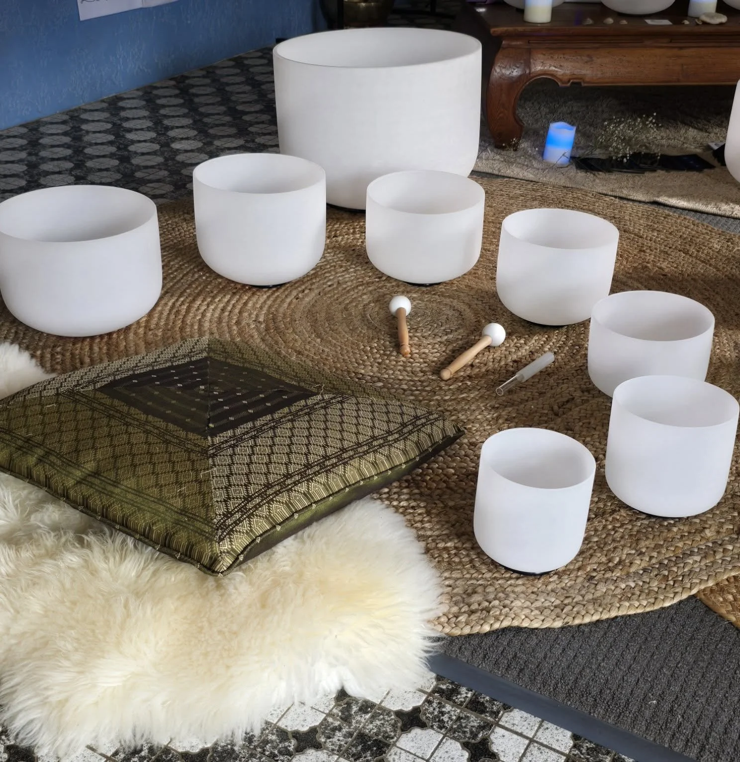 Image of sound bowls on woven rug