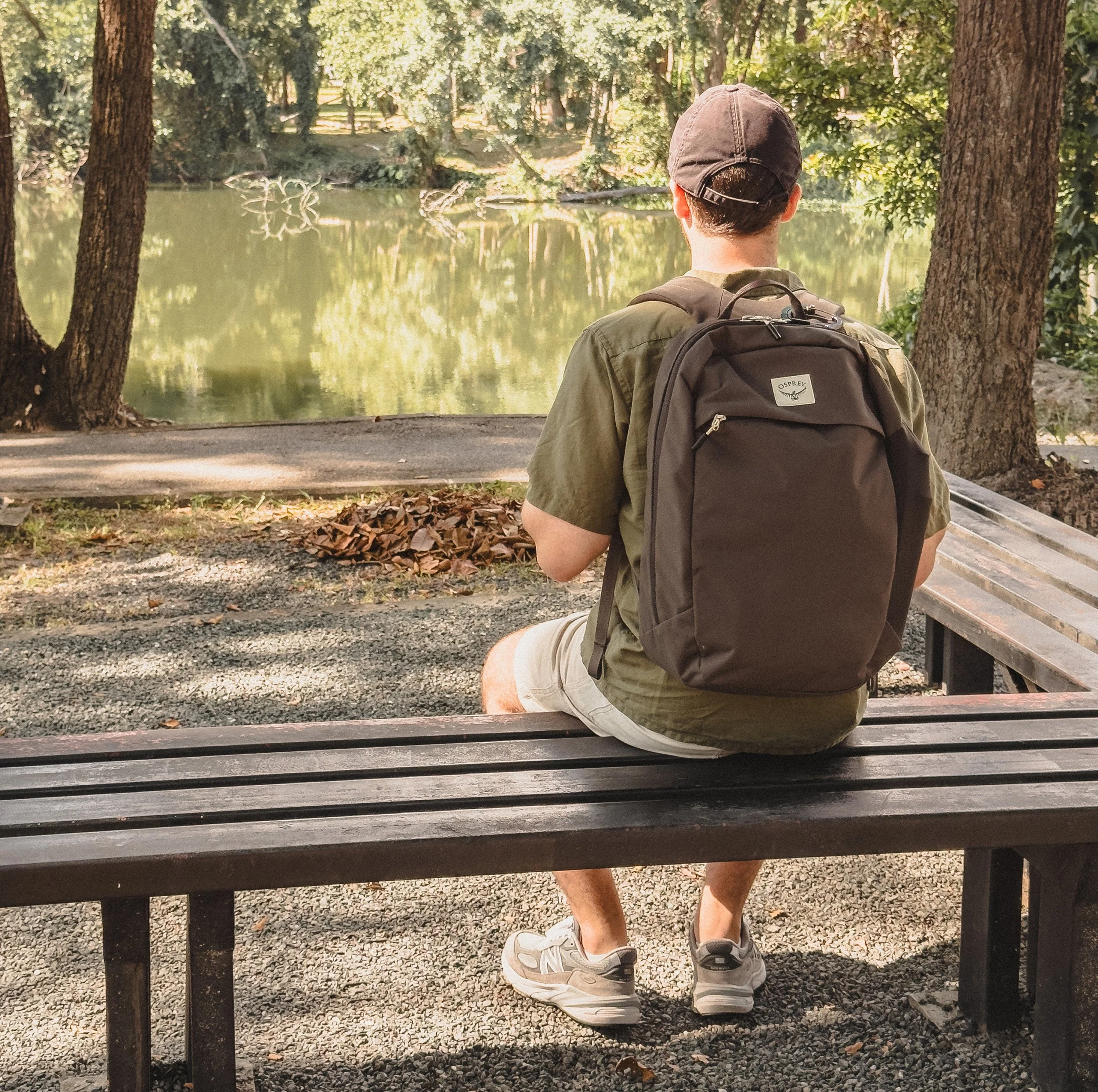 Me sitting on a bench in the Osprey Arcane on my back.
