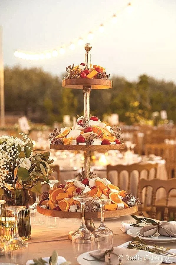 Laurie’s customers, Fernando and Kate embracing by the lake on their wedding day.