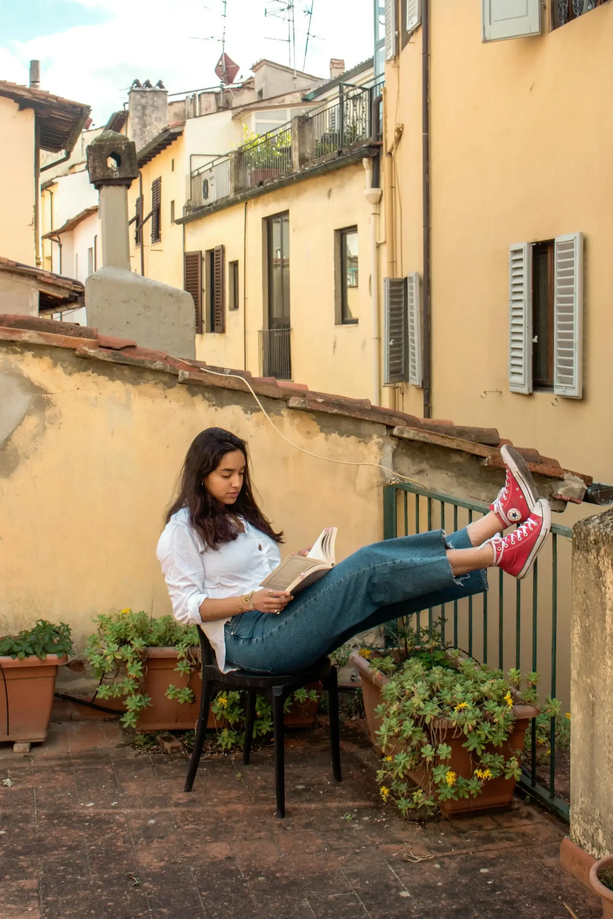 Woman reading a book to learn a language
