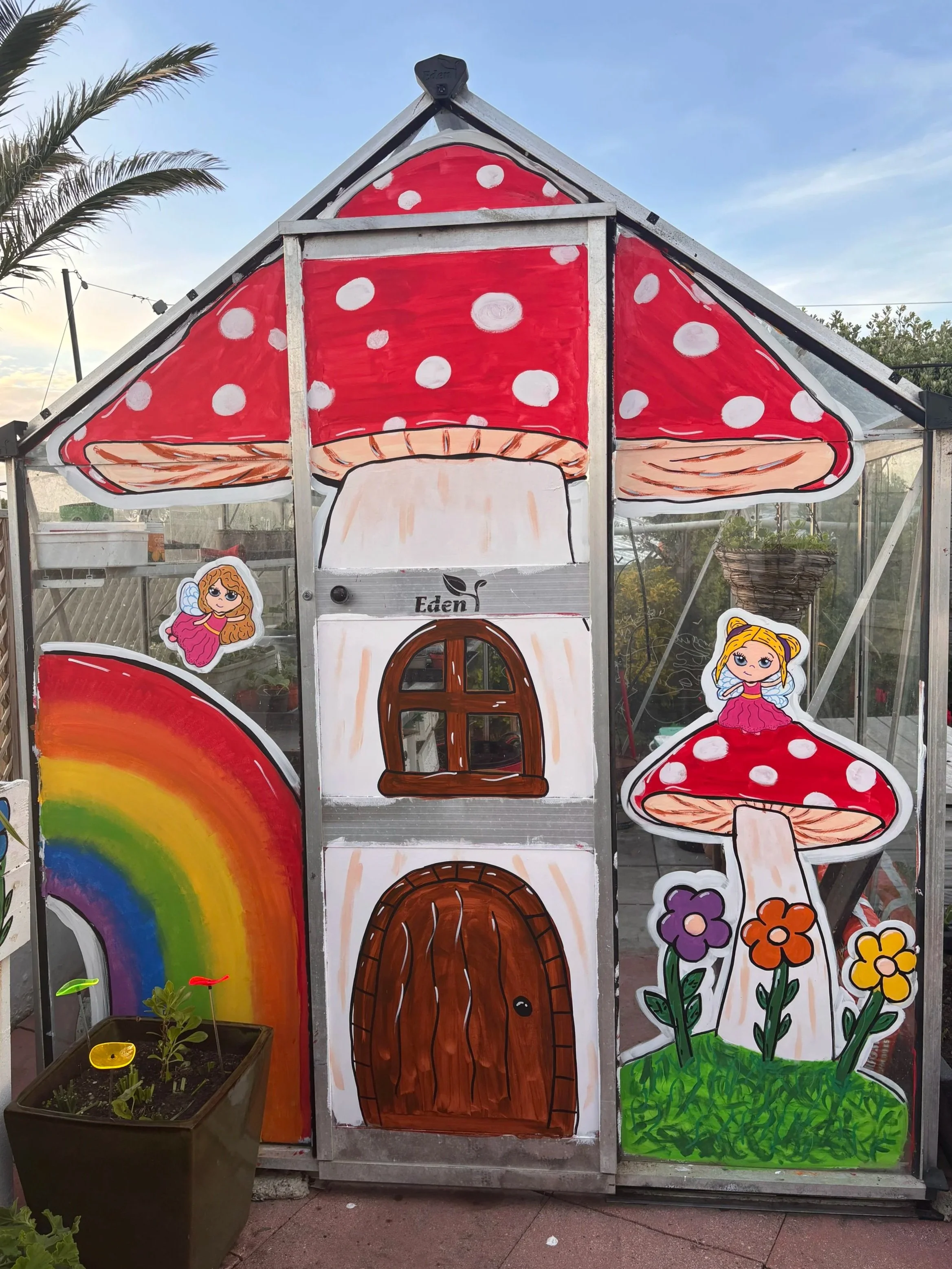 fairy-tale themed window mural. Window artist, seasonal window art