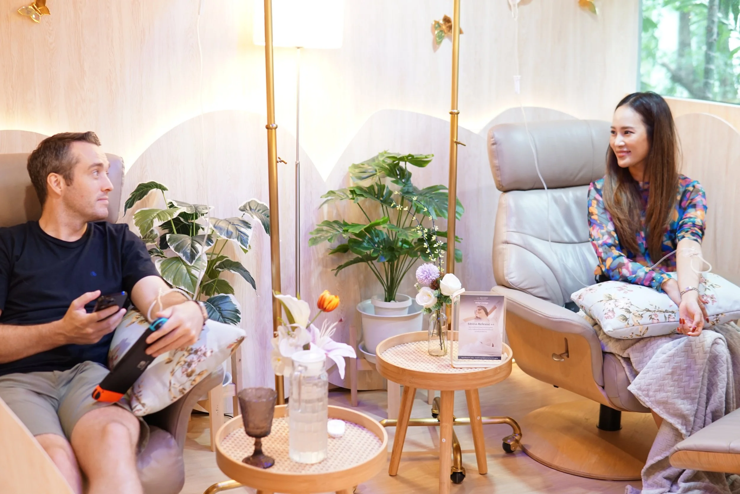 Couple Getting an NAD+ IV Drip at MICHIKO Wellness in Bangkok, the place to get IV Drips near EmSphere and Phrom Phong