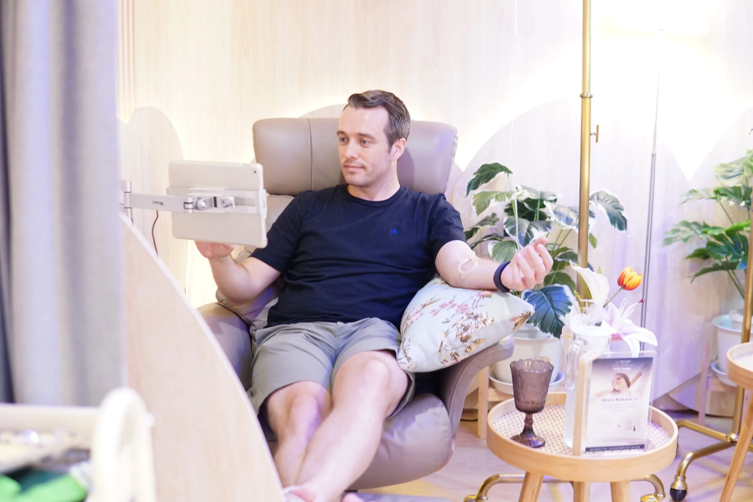Watching netflix while getting an IV drip at MICHIKO Wellness
