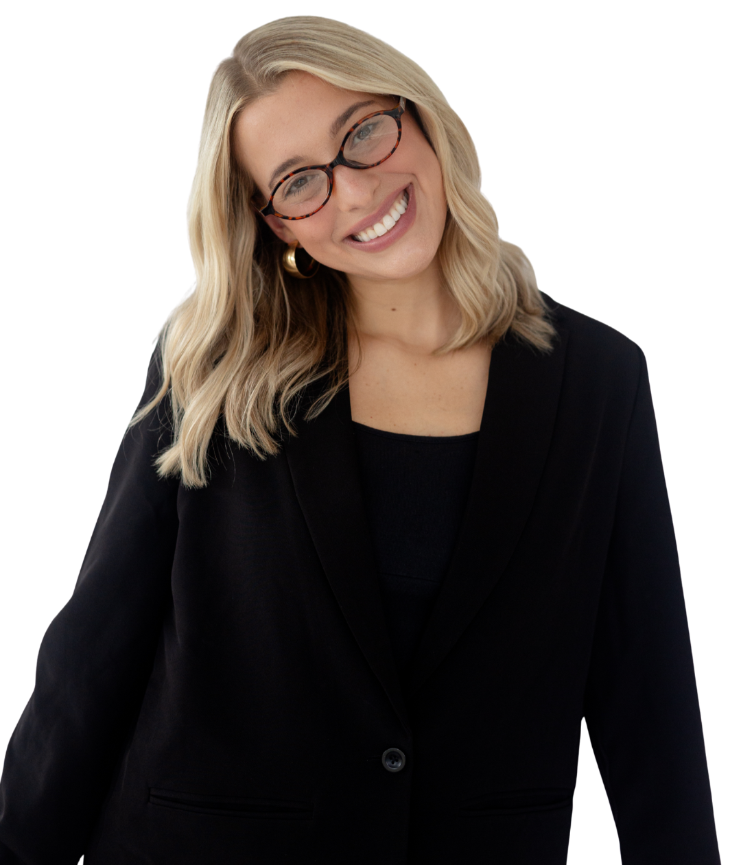 A young woman with blonde hair, wearing glasses, a black blazer over a black shirt, and gold earrings, smiling at the camera.