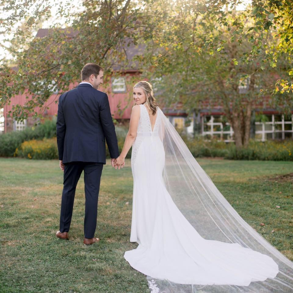 Meredyth with her husband on their wedding day