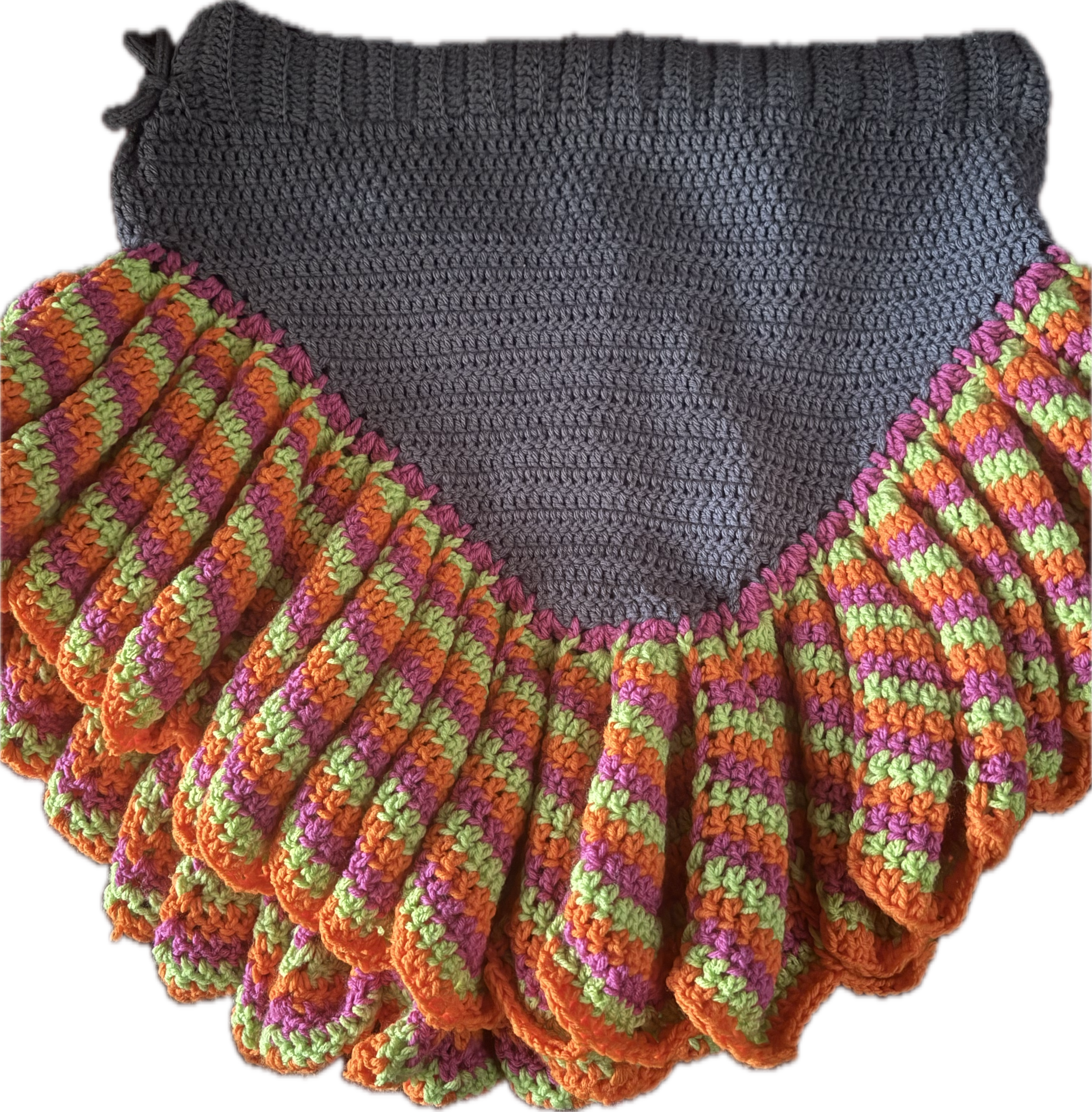 A crocheted item combining a gray hat and a pleated multicolored skirt with orange, pink, green, and purple yarns.
