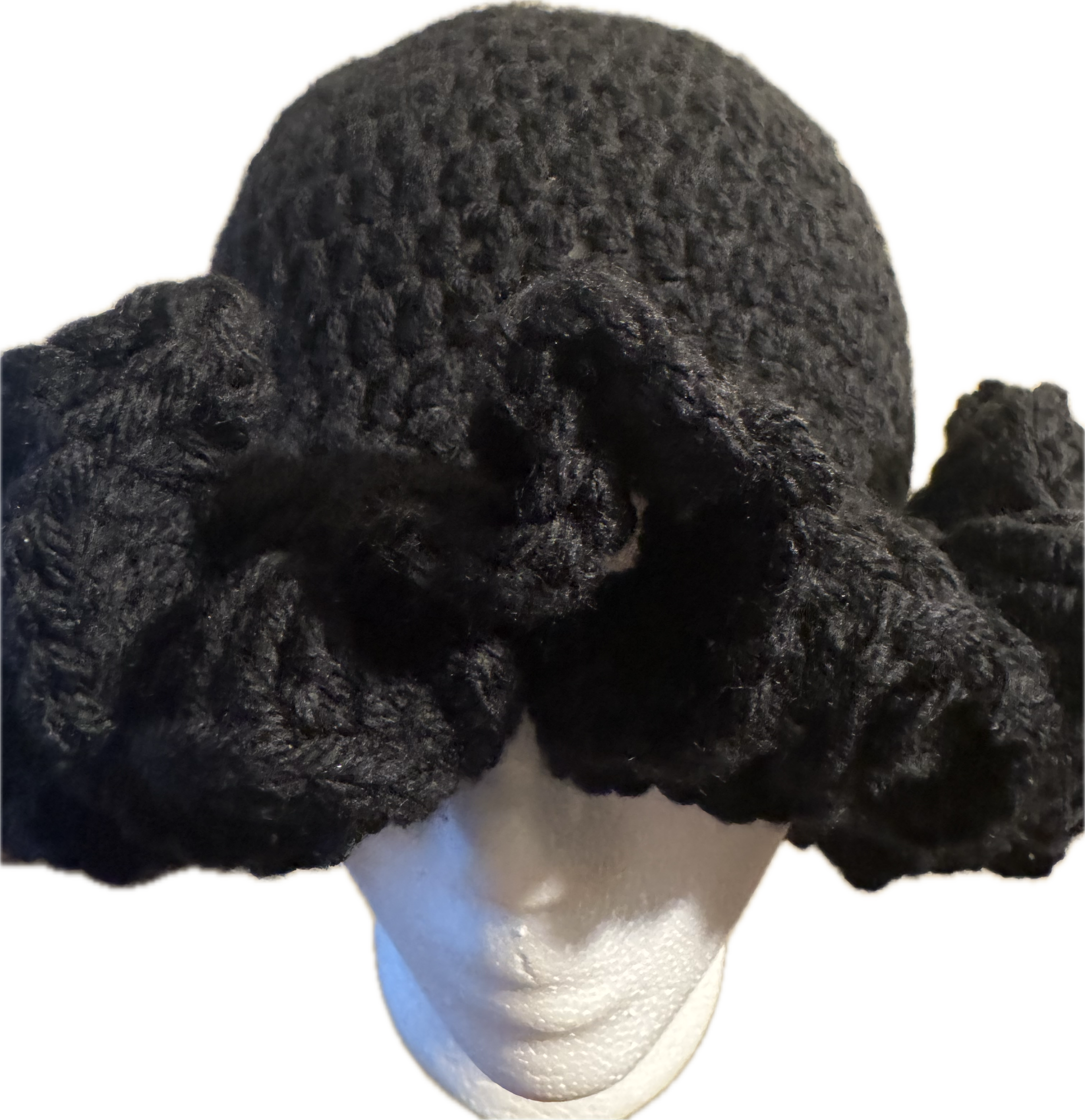 A black crochet ruffle bucket hat.