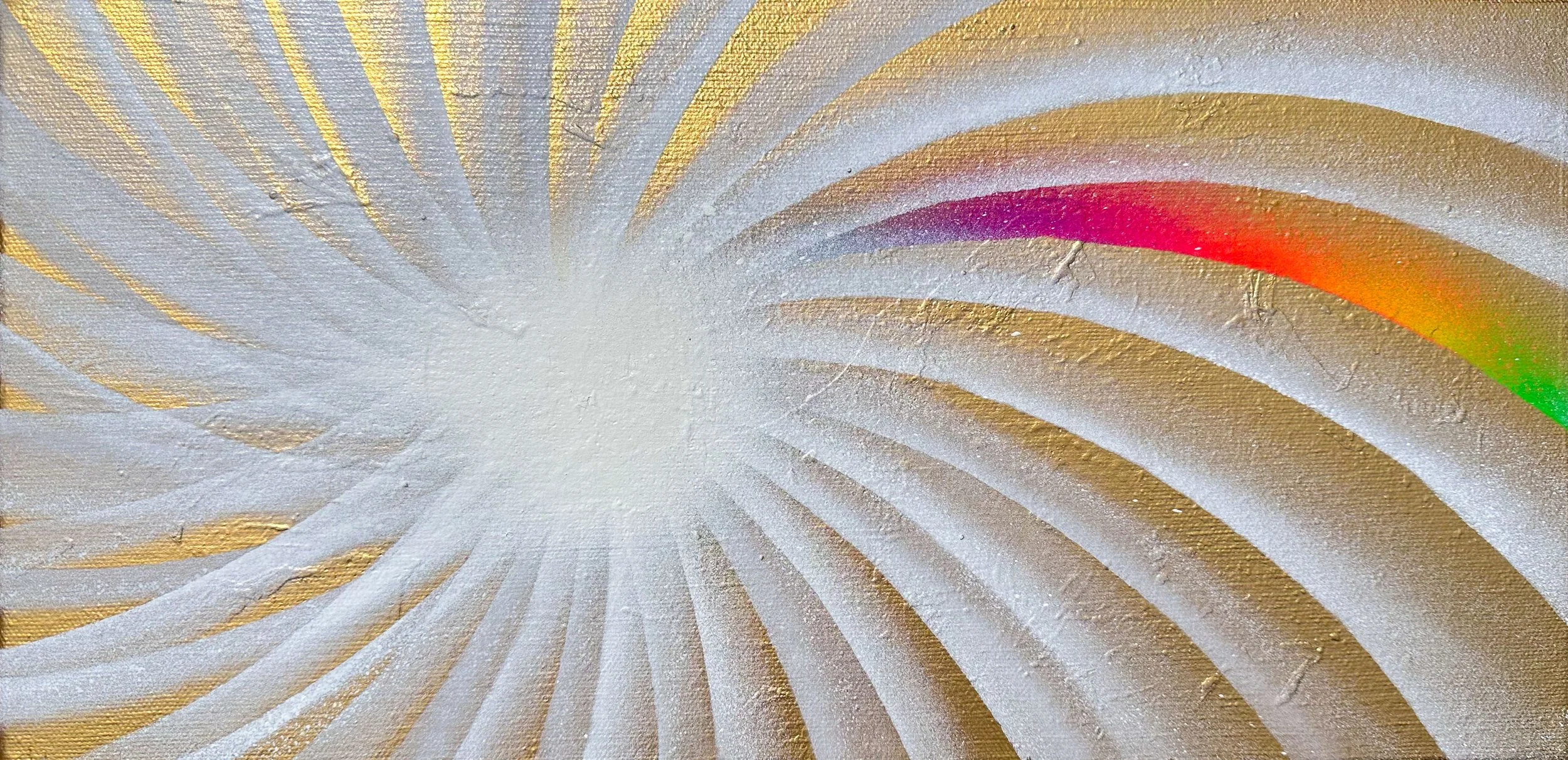 Abstract artwork featuring a white center with radiant gold streaks and a rainbow arc with gradient colors of pink, orange, yellow, and green on a textured surface.