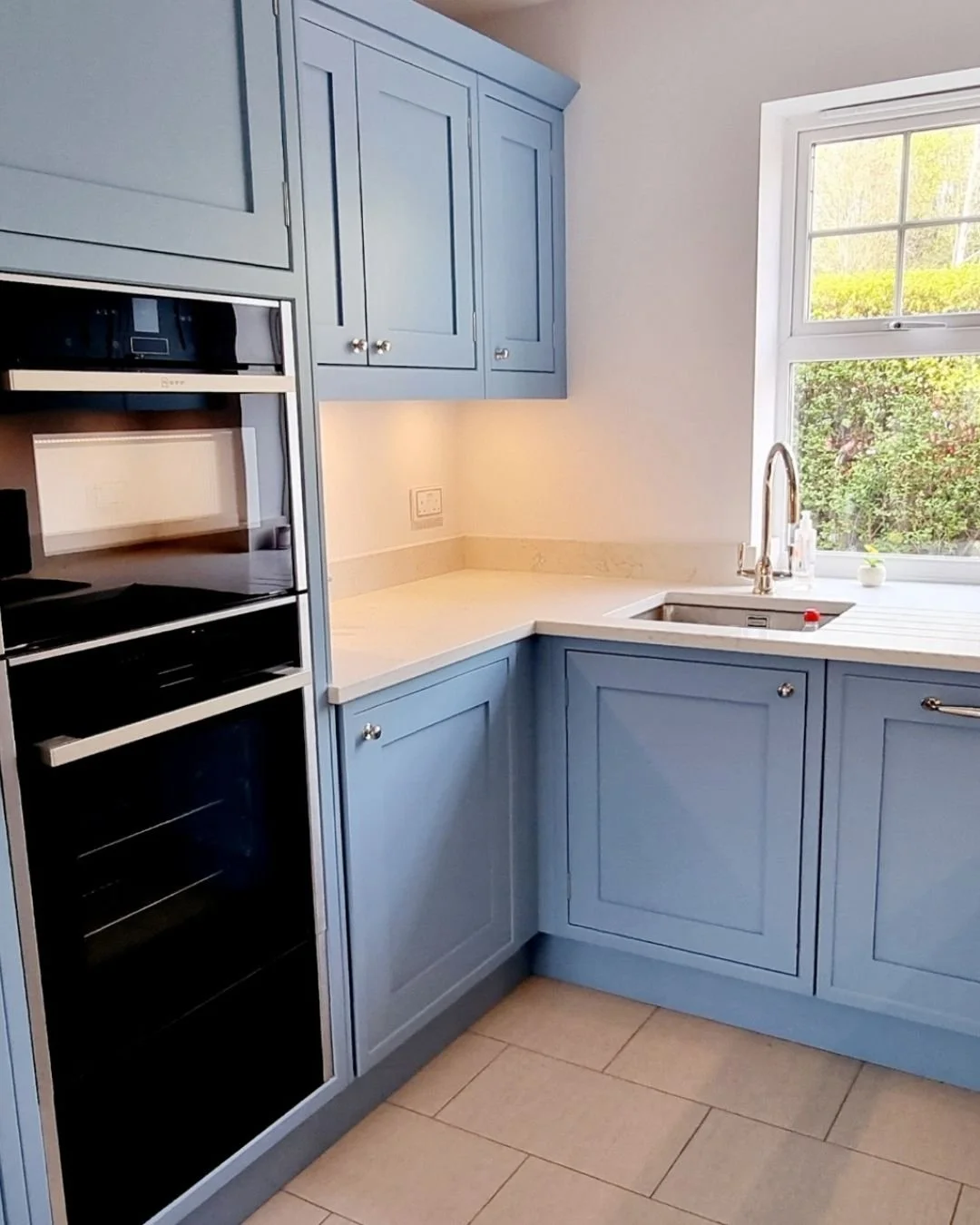 Total transformation! 

We repositioned the kitchen from the front to the back of the house, opening the ground floor up to take advantage of the garden views.. In-frame shaker cabinetry in Little Green's Grey Stone, NEFF ovens, Amtico flooring in Si