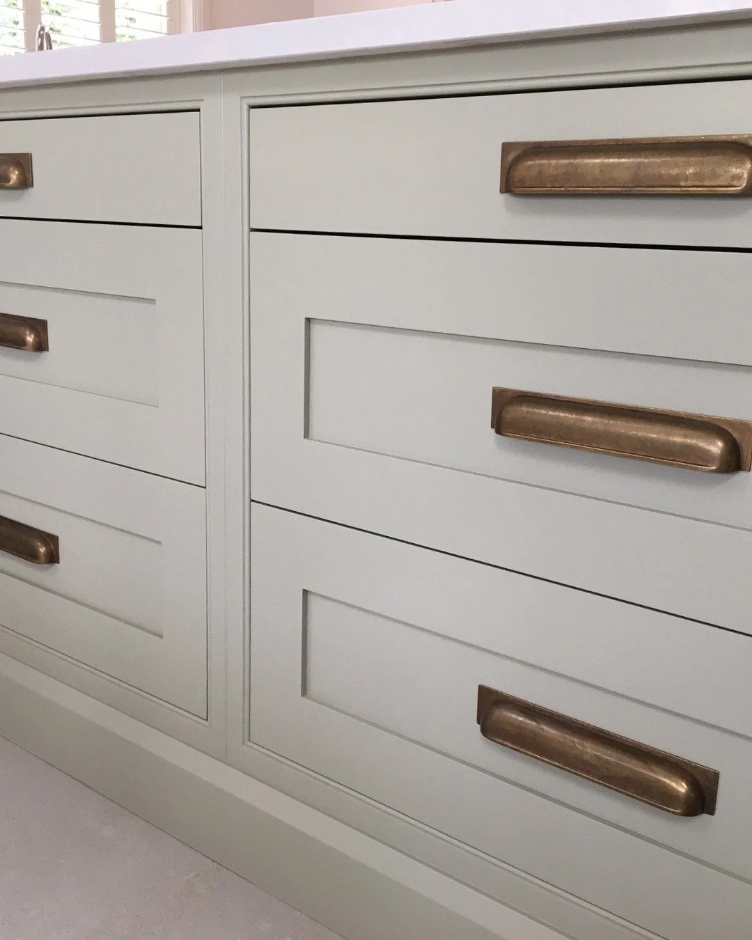 Your kitchen handles are one of the first things you touch and one of the last things we specify - because it only makes sense once everything else is resolved. This pairing was chosen for the warmth it brings to a cooler palette.

You're welcome to 