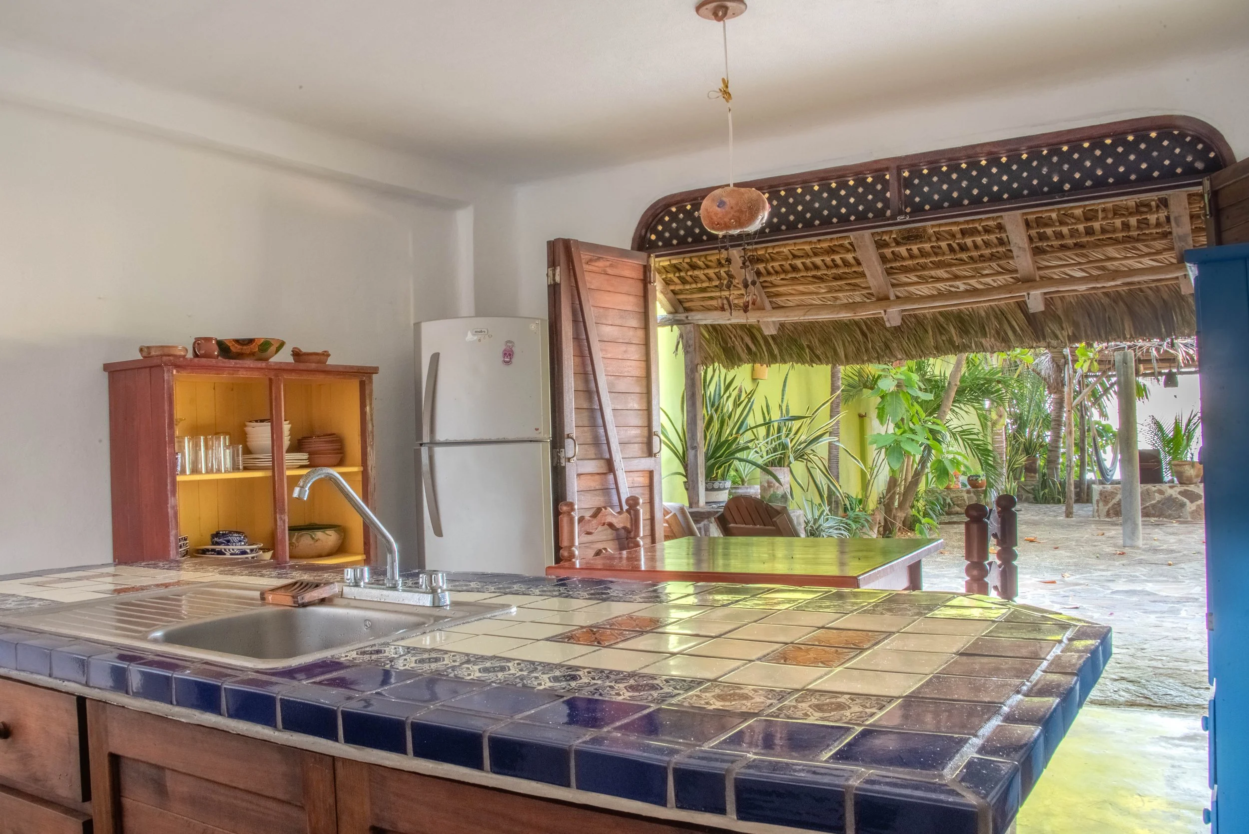 View to outside from the kitchen of Suite II at oceano vacation rental in San Agustinillo in Oaxaca Mexico.