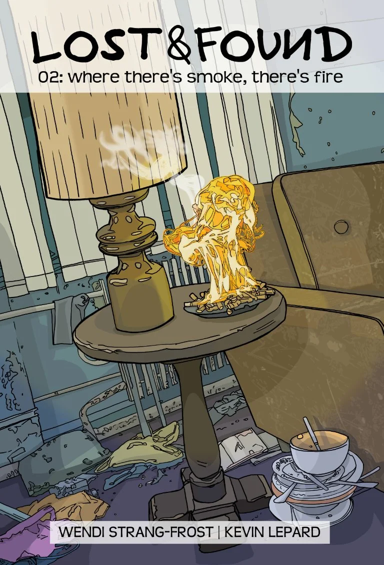 The cover of Lost&Found 02 showing the corner of a messy apartment. The ashtray by the end of the couch has burst into flames.