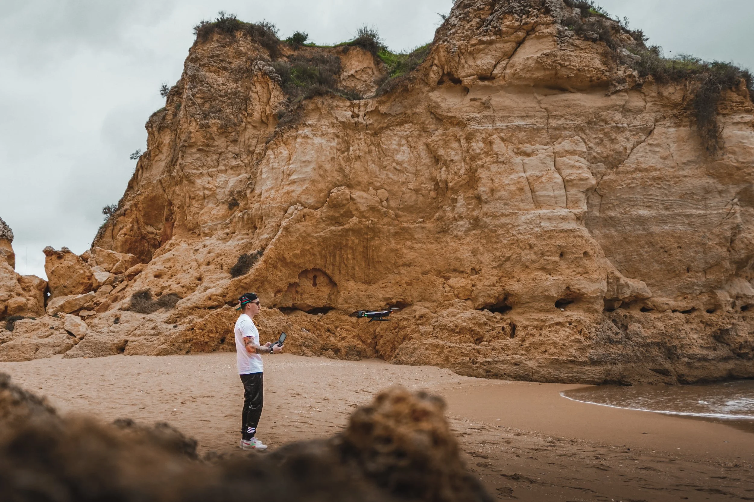 Flying drone at Praia Batata, Portugal