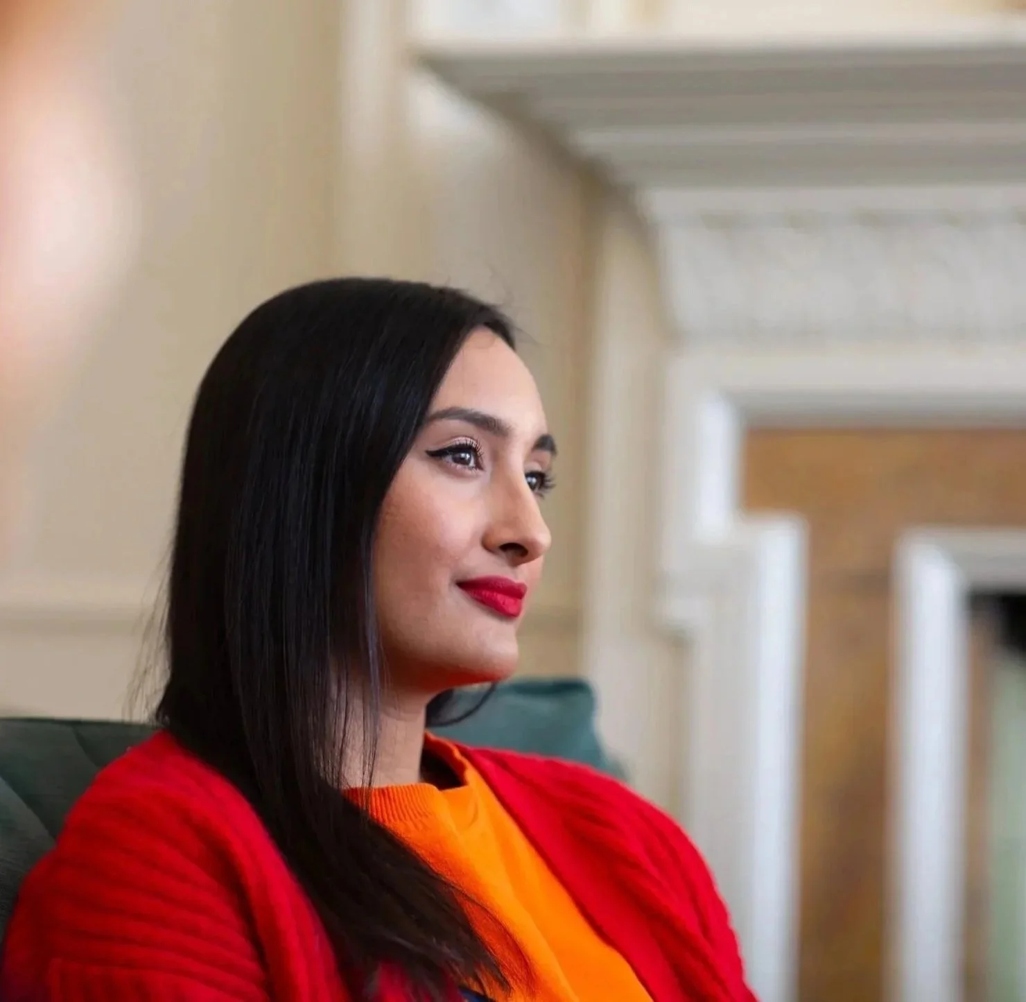 Chandni Rajput, registered counsellor and psychotherapist, seated in a counselling room in London.