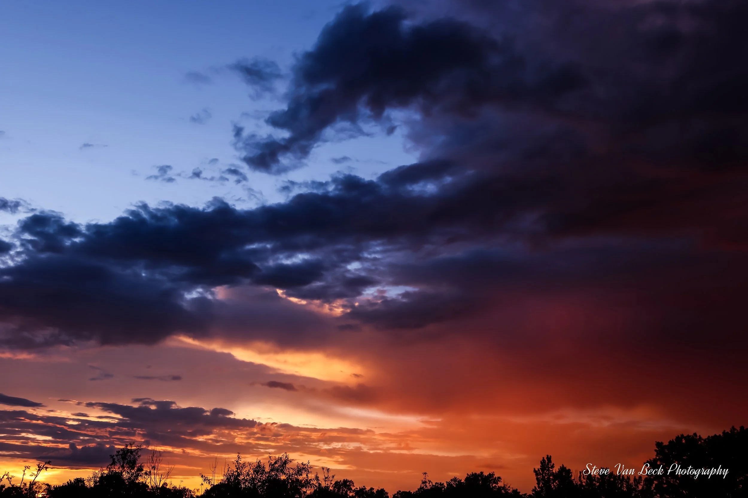 05. Stormy May Sunset.jpg