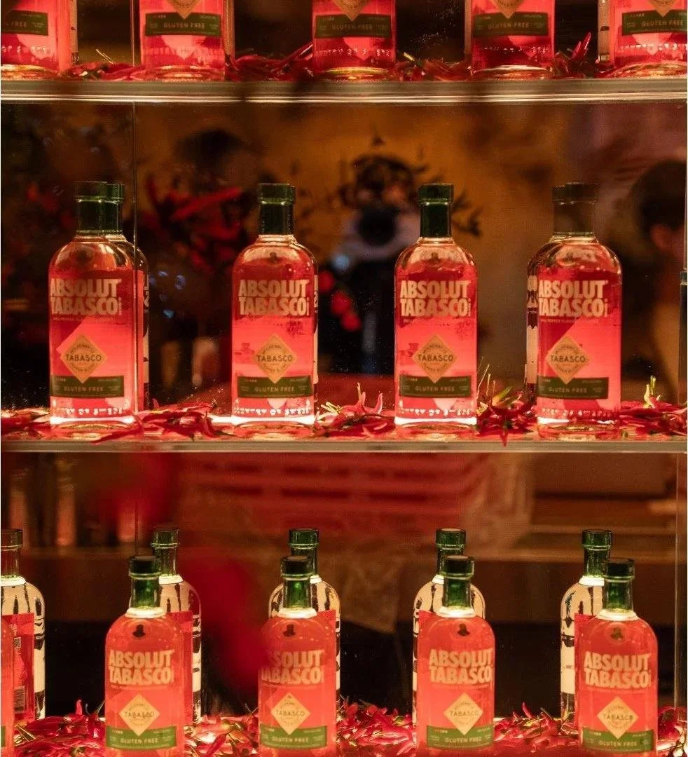 Absolut - bottles in a row on display.jpg