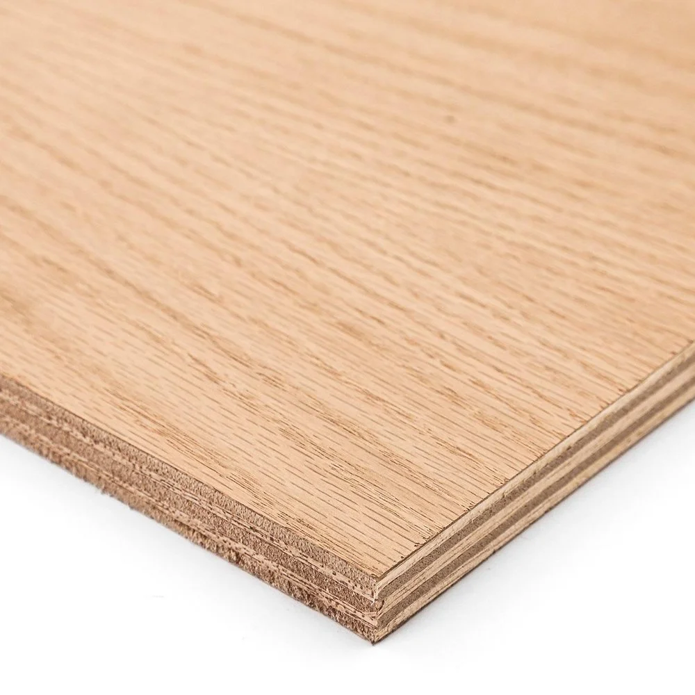 Close-up of a light-colored wooden plywood sheet showing layers.