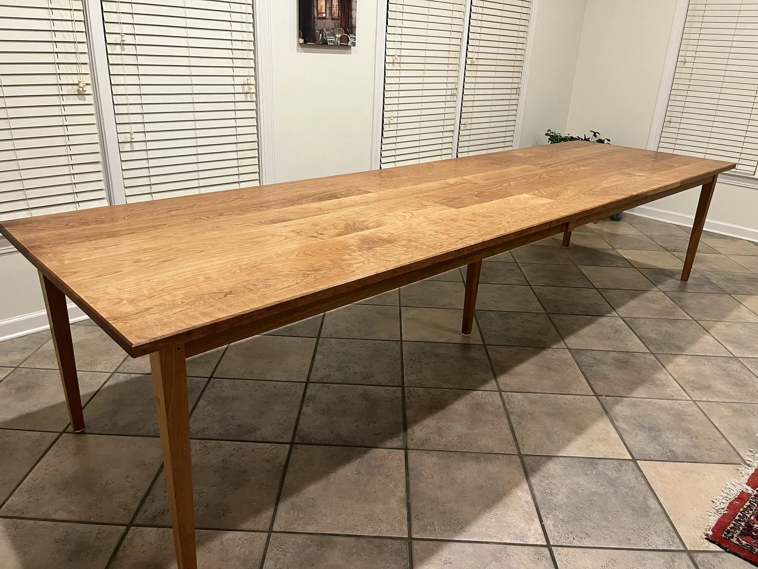 A long wooden dining table.