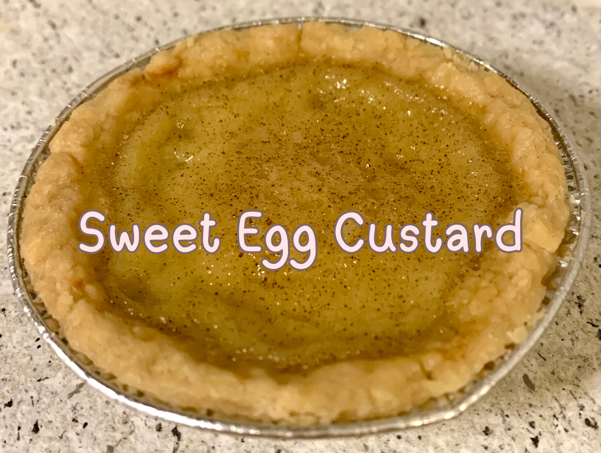 Mini sweet egg custard pie with a smooth, golden custard filling.