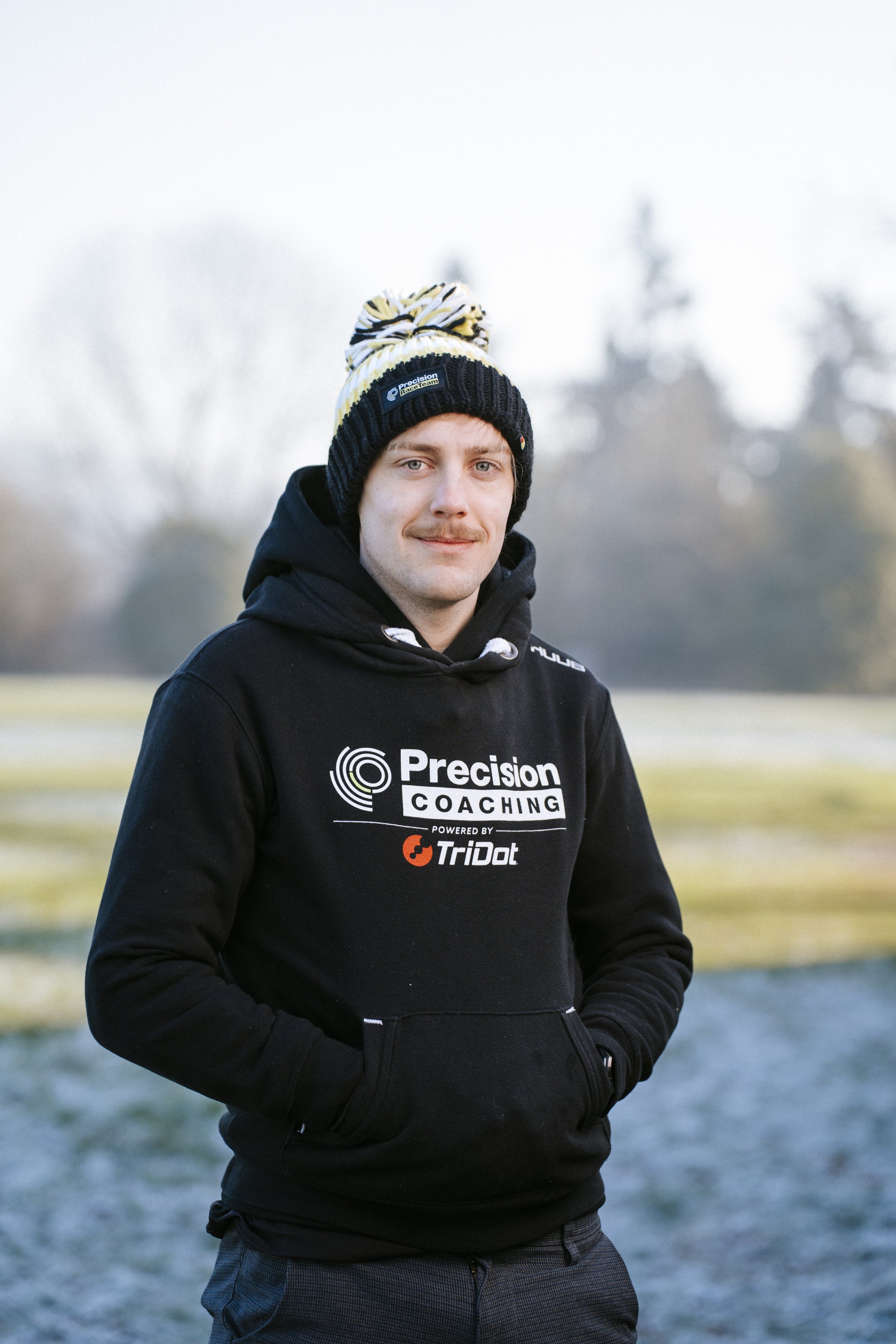 Professional coaching headshot of a tridot, triathlon coach and personal trainer.