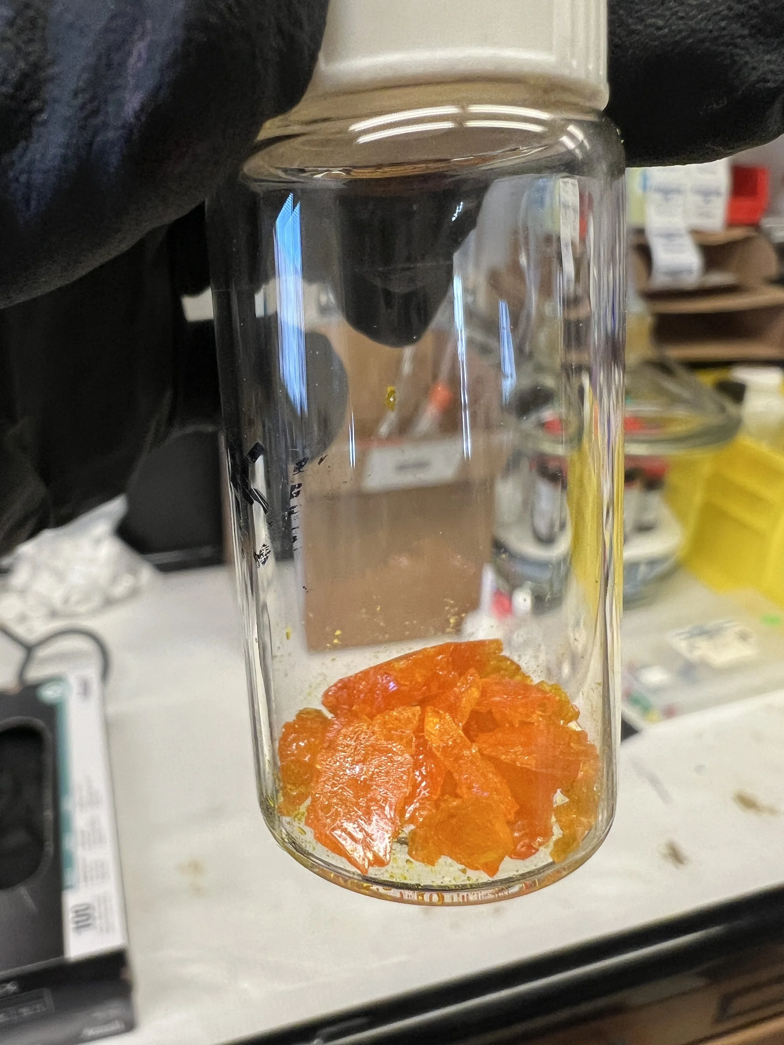 Vial with orange Crystals