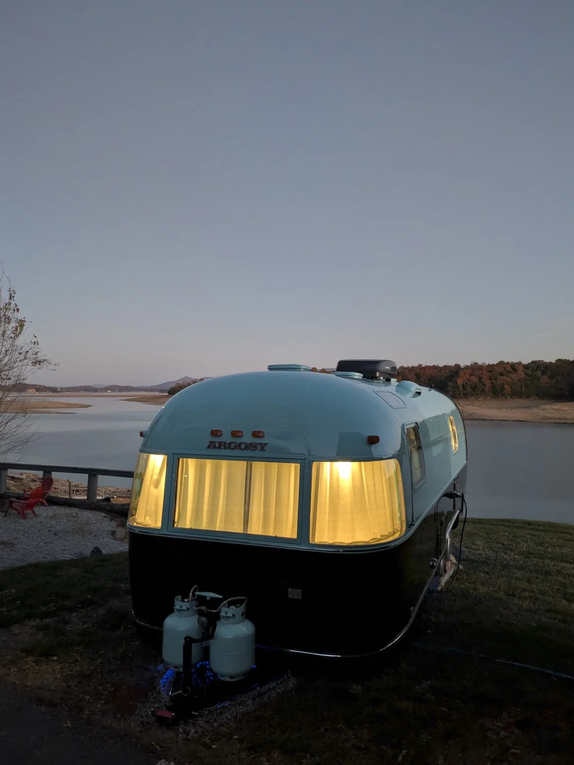 Mounted just to the right of the entry door is an uncirculated 1776–1976 silver dollar. I added it as a simple tribute to the trailer’s bicentennial-year build. It’s a small detail that helps connect it to its history and the era it originally came f