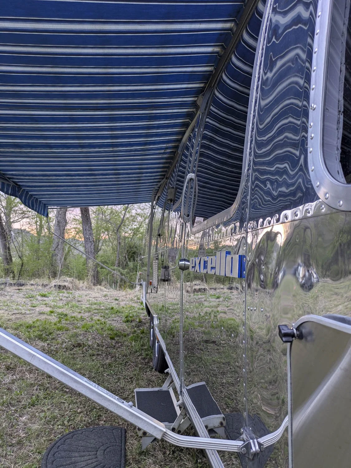 The Covered Patio Area create a comfortable place together, relax or enjoy meals outside the camper.