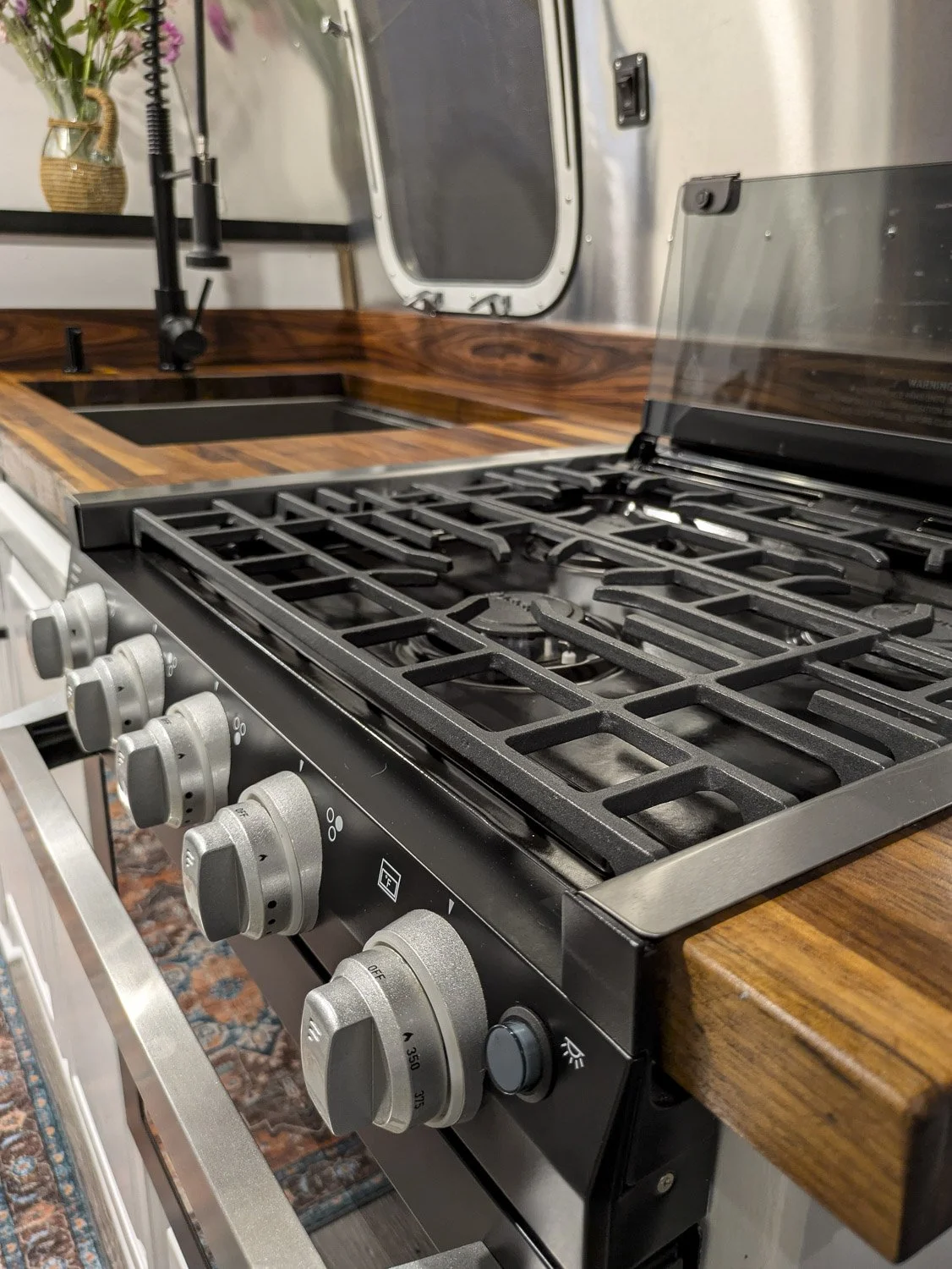  A Modern Gas Range brings every day functionality into the updated kitchen design.