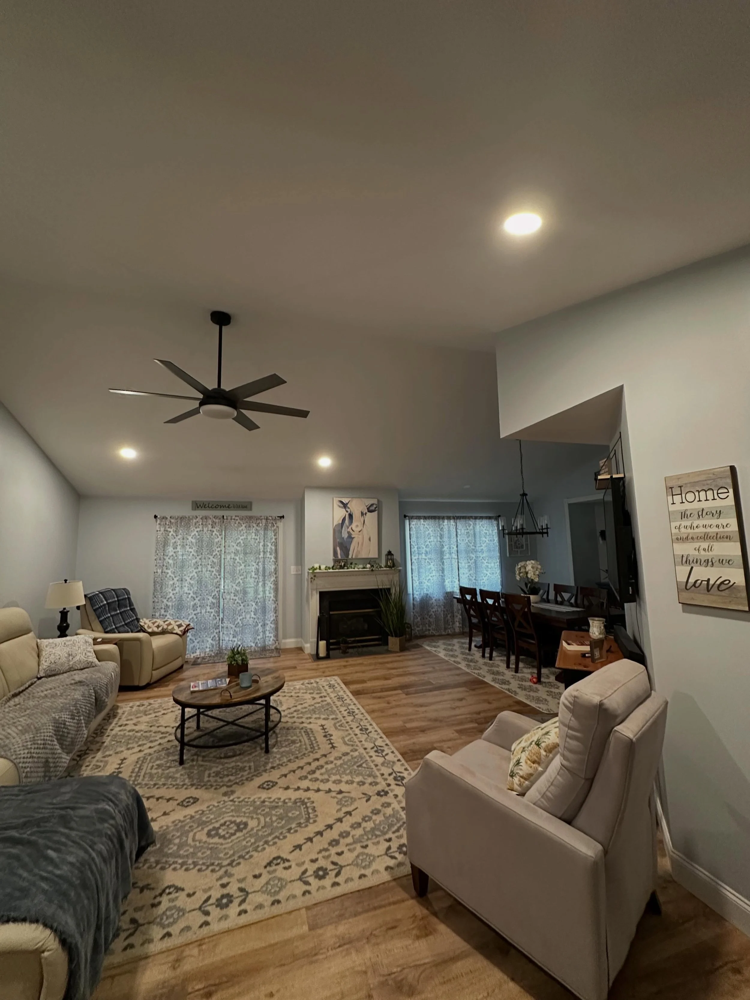 Fresh can lighting install bringing this living room to life.