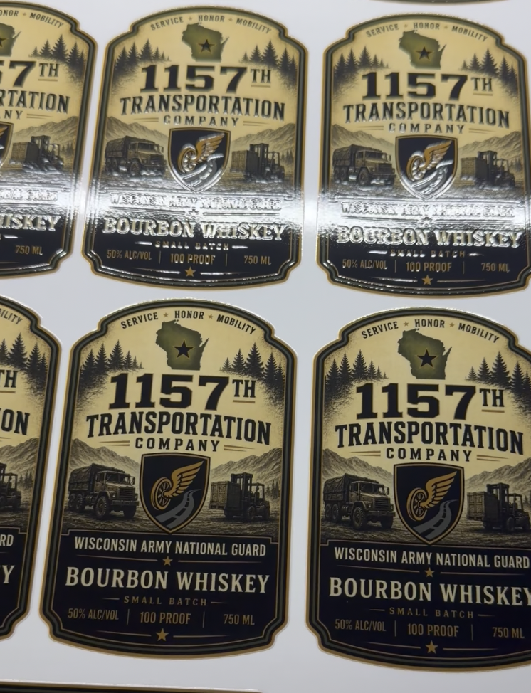 1157th Transportation Co. | Commemorative Bourbon Labels
High-definition UV print on weather-resistant substrate. Featuring raised-ink textures and custom military heraldry. Built to endure, designed to honor.