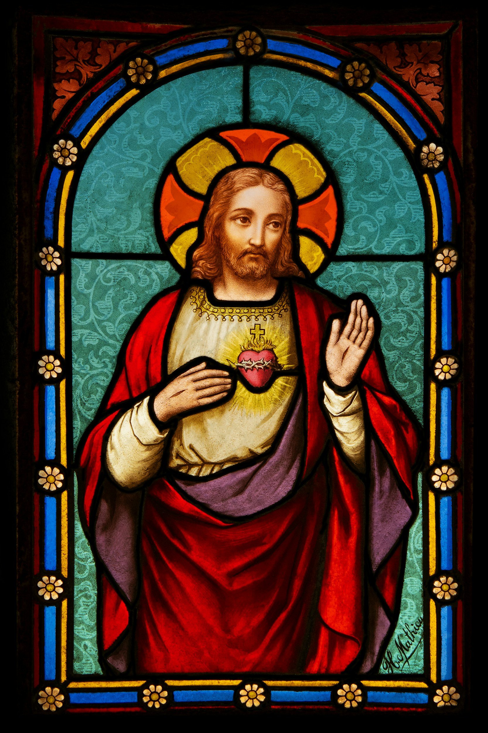 stained glass of jesus and his sacred heart