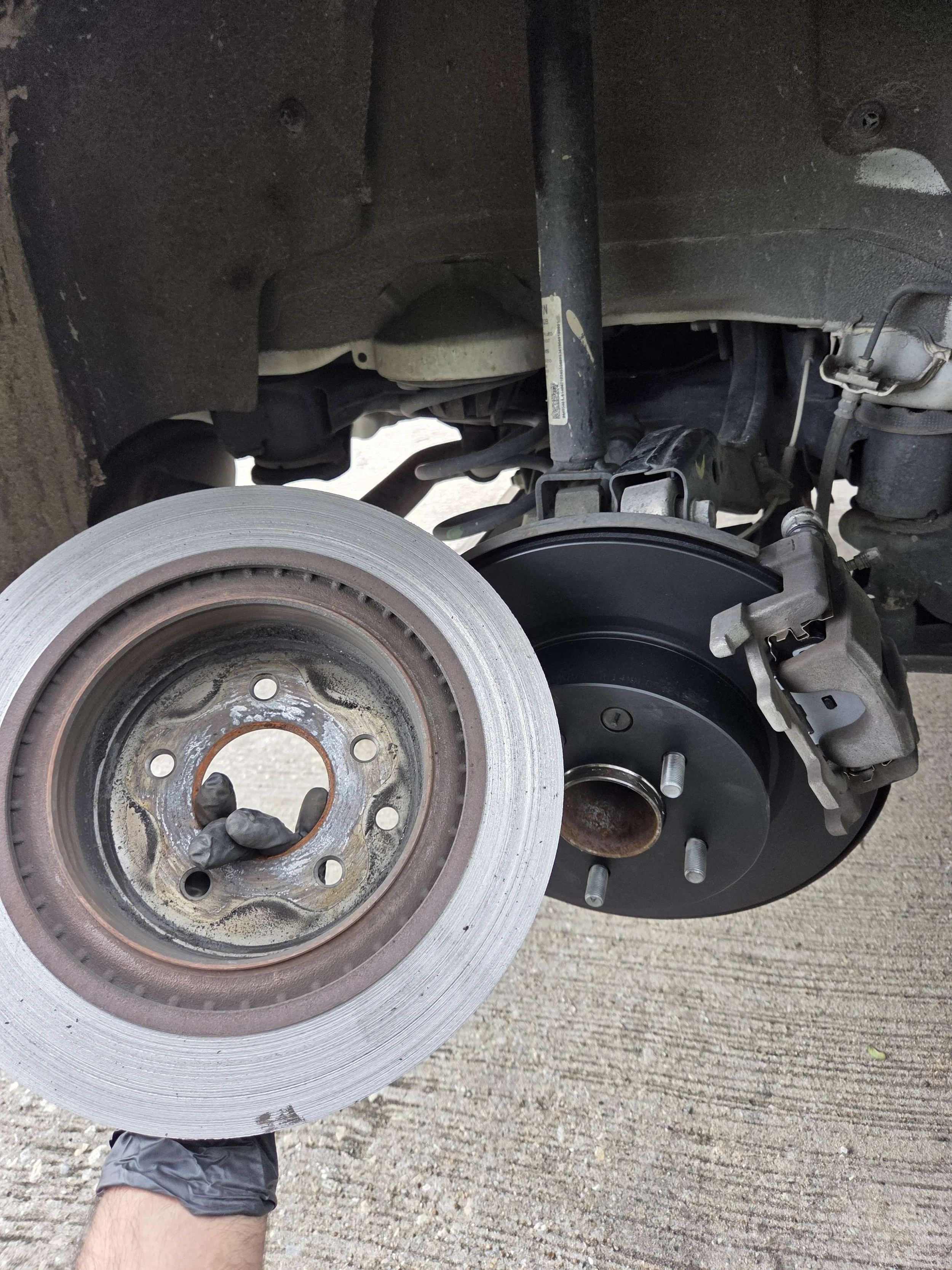 2019 Nissan Maxima rear brake pads and rotors replacement completed in McKinney, TX
