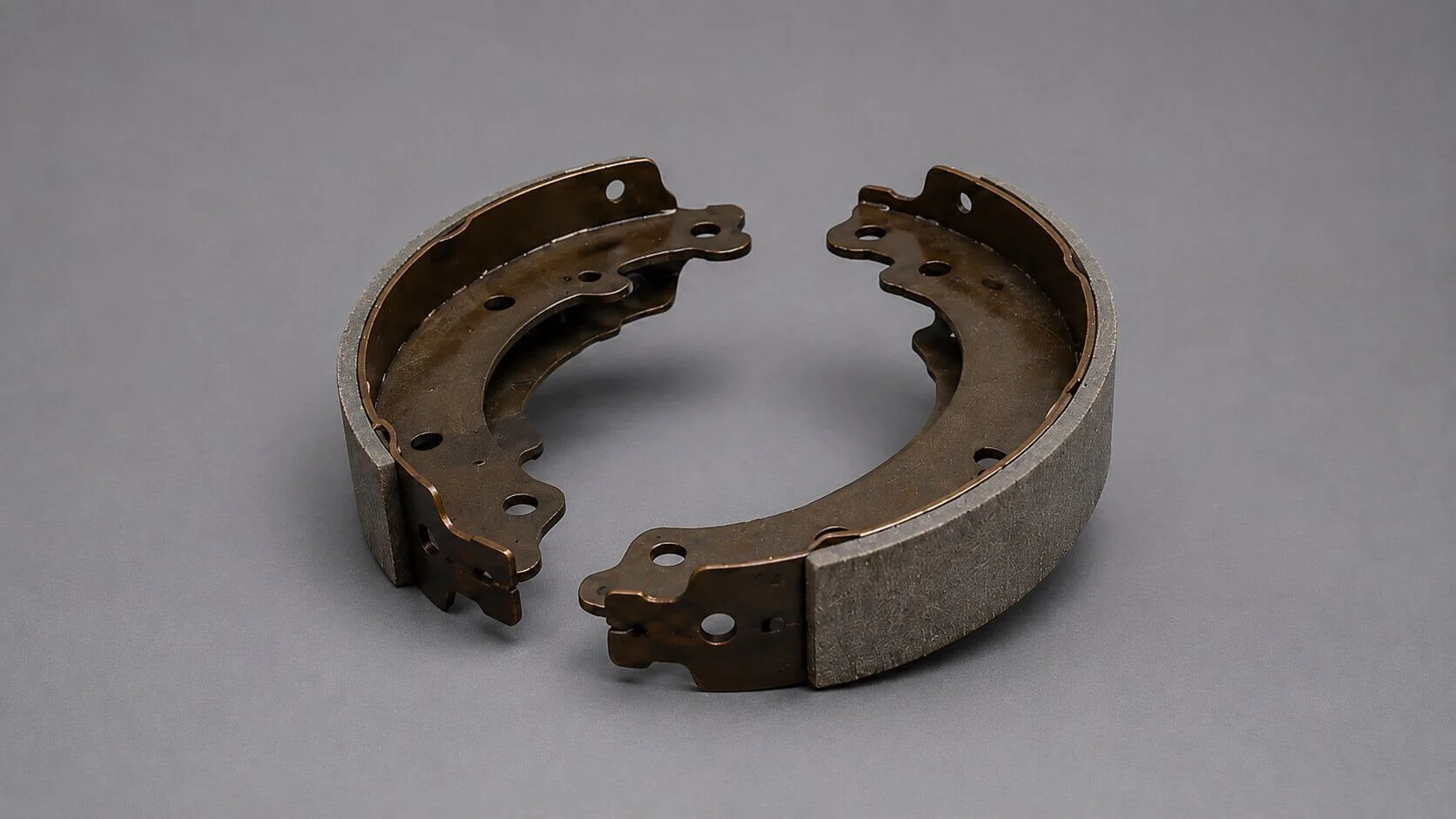 Rear drum brake shoes used during brake repair and brake shoe replacement