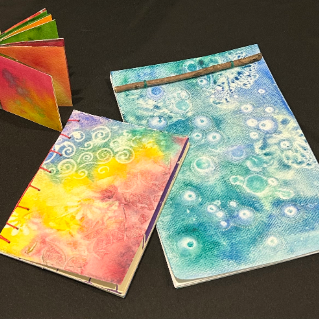Handmade books w_watercolor covers.jpg