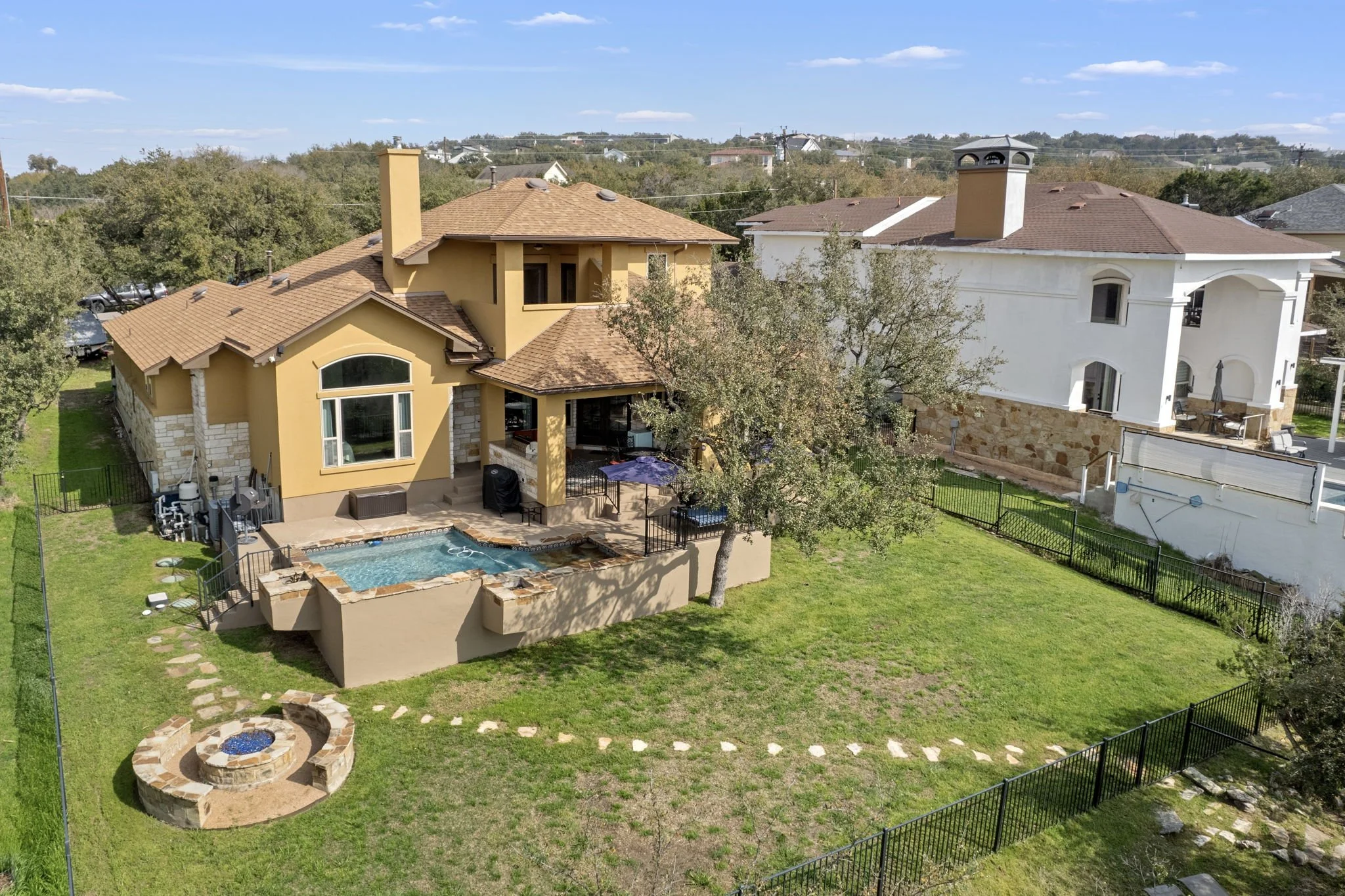 Beautiful home and pool off of Lake Travis, in Texas.