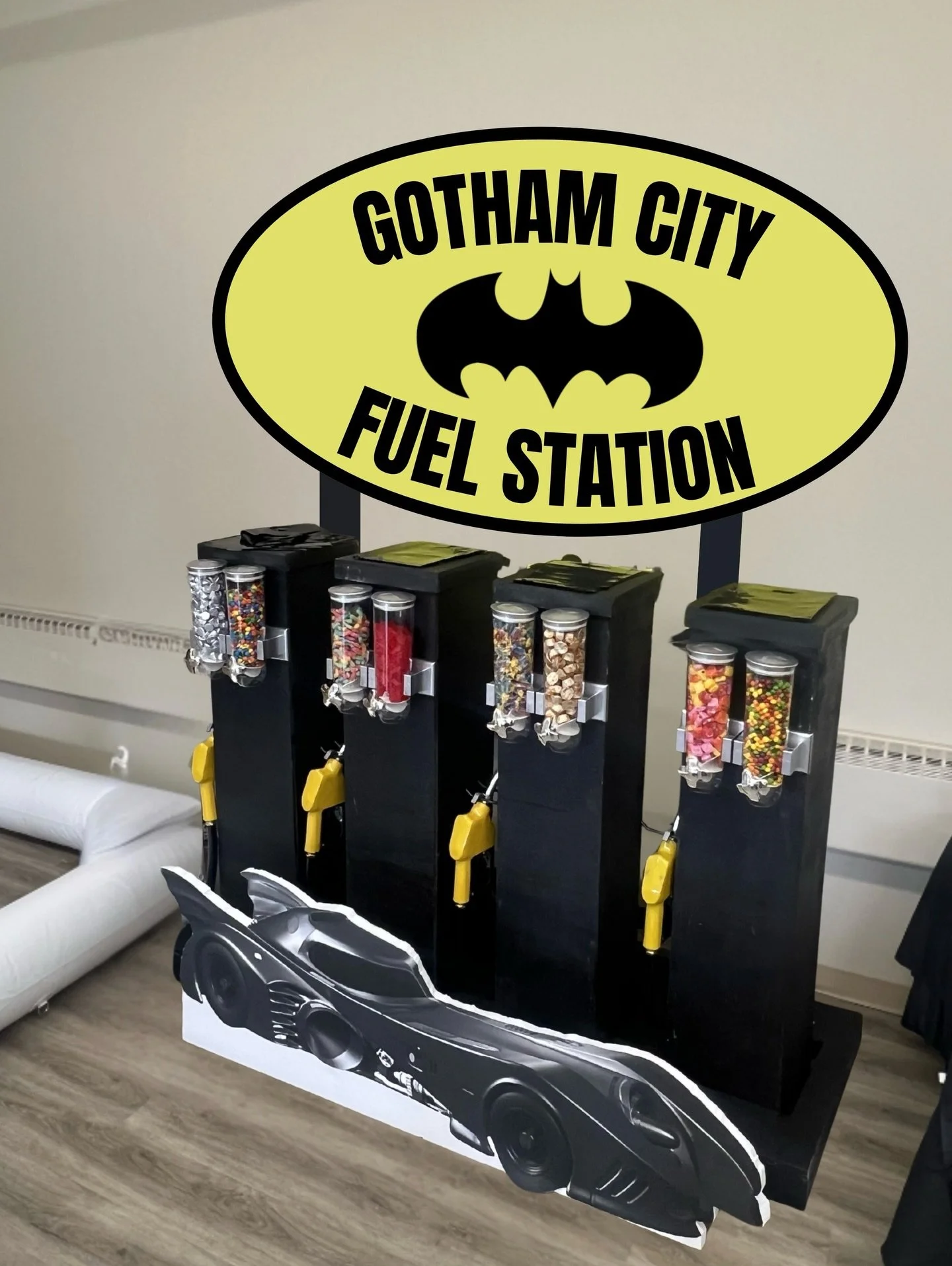 Fuel up before saving Gotham! 🦇⛽️
Our Gotham City Fuel Station lets little superheroes fill up their Batmobiles with candy before heading back into action.

This candy station can be customized to match any theme or color palette, making it the perf