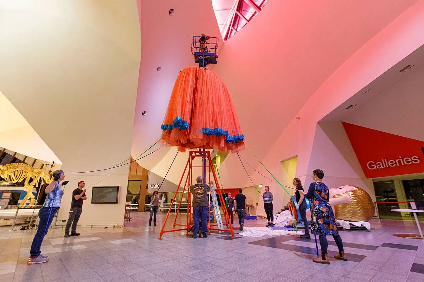 Textiles Technician - 2000 Olympics Kewpie Doll install