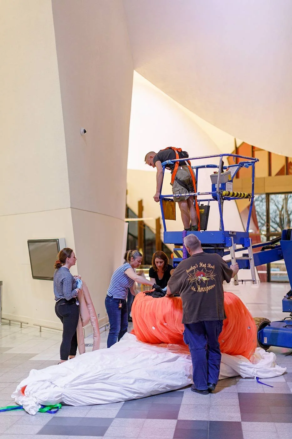 Textiles Technician - 2000 Olympics Kewpie Doll install