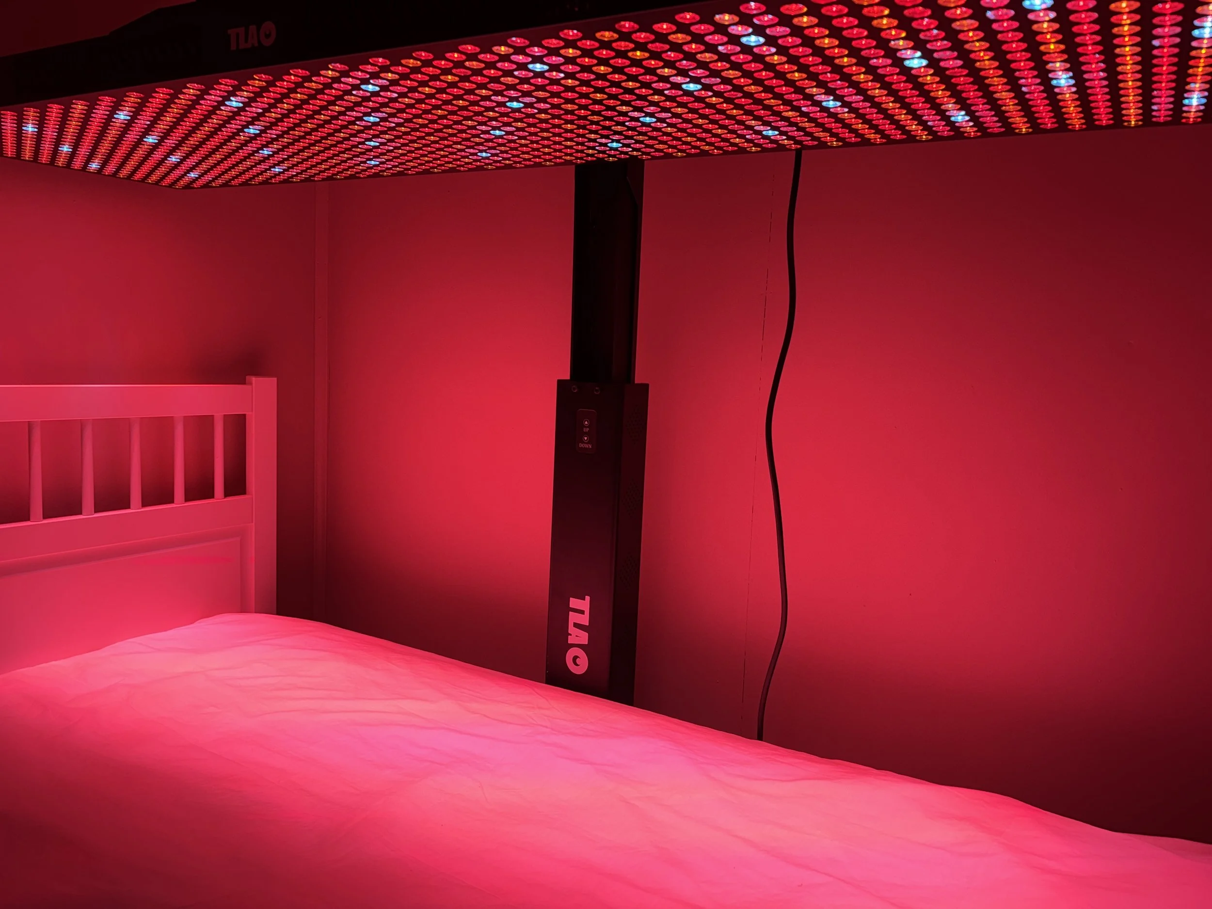 Real Wellbeing's wellness room for red light therapy and massage treatments in Pheasants Nest.