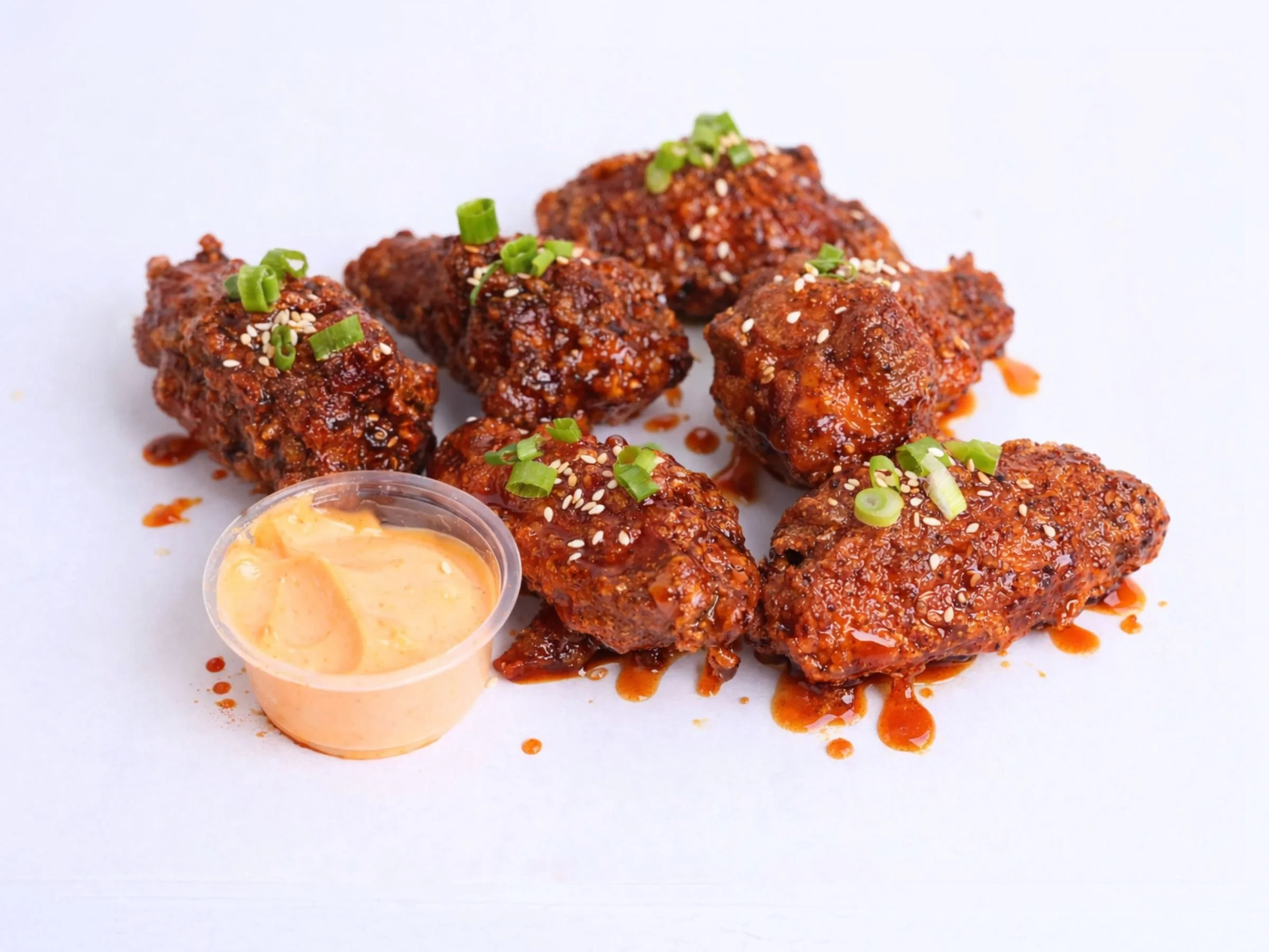 korean fried chicken wings with salsa macha and gochujang mayo