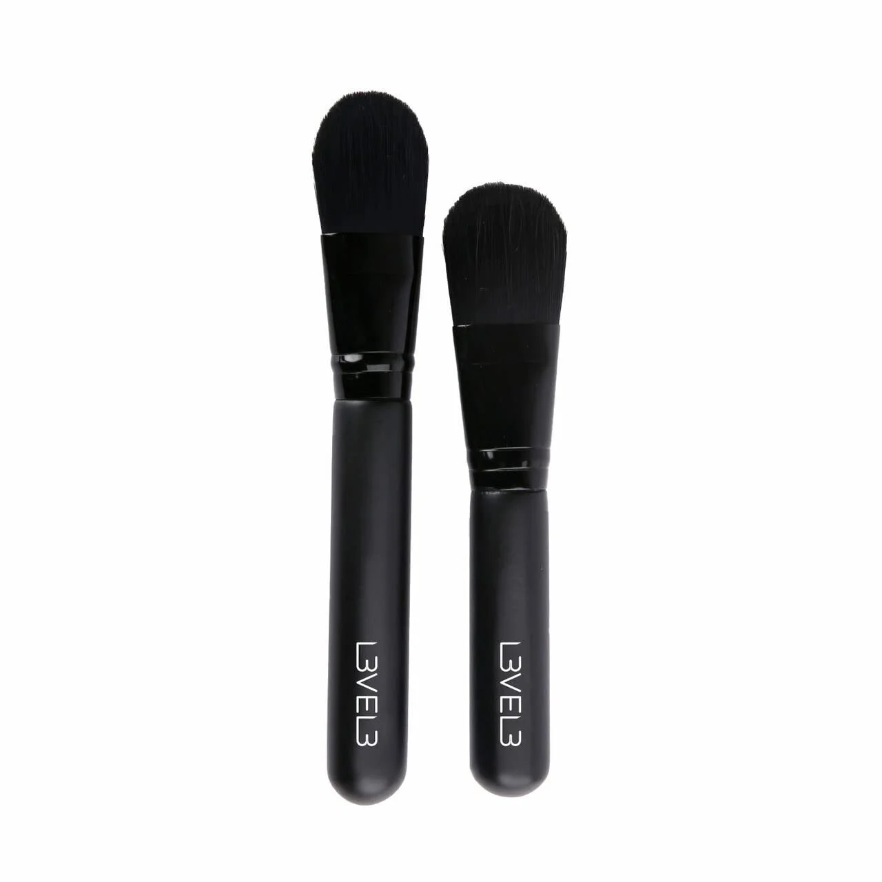 Two facial brushes