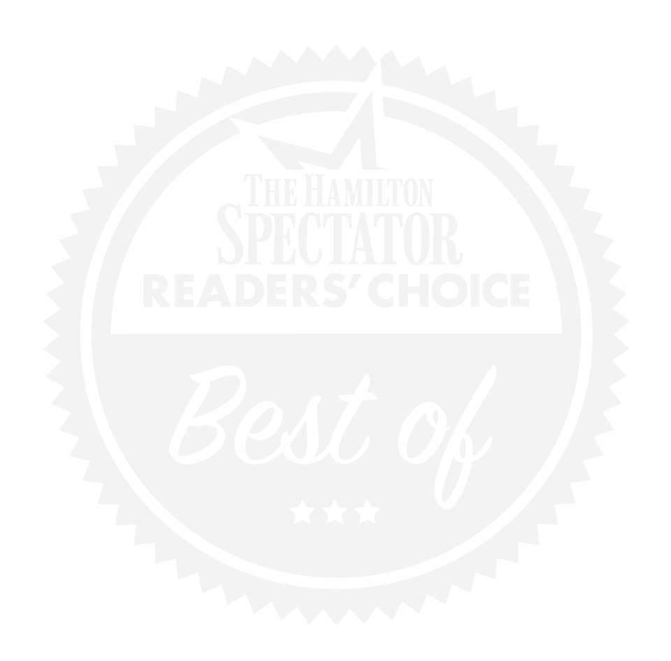 A badge or sticker with a circular design that reads 'The Hamilton Spectator Reader's Choice Best of' and has stars at the bottom, indicating an award or recognition.